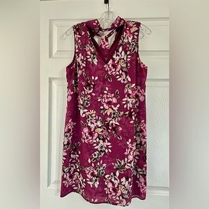 Beautiful plum floral lined dress perfect for Easter. Connected long tie.
